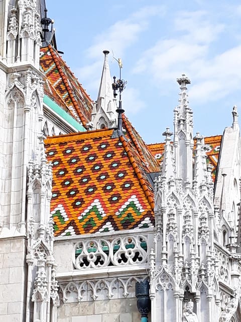 Budapest: Buda Castle Walking Tour & Folk Music Performance - Tárnok Street and architectural variety you can actually spot