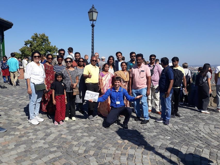 Budapest: Buda Castle Walking Tour & Folk Music Performance - Government buildings, a funicular viewpoint, and Pest-side panoramas