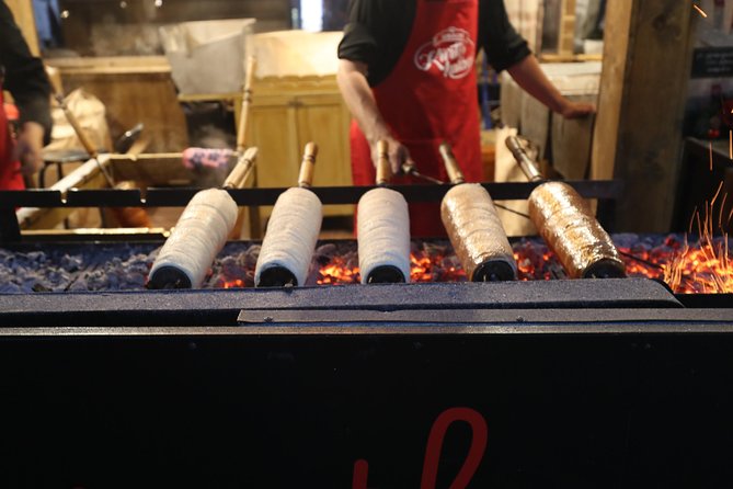 Budapest Christmas Market Tour with Basilica visit & Chimney cake - The food and drinks: chimney cake, mulled wine, and classic treats