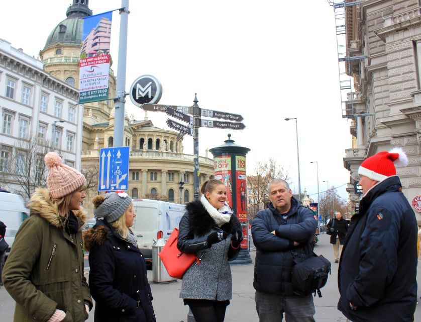 Budapest Christmas Walking Tour w Entry to Basilica - City Hall Courtyard: ice skating energy and visible charity points
