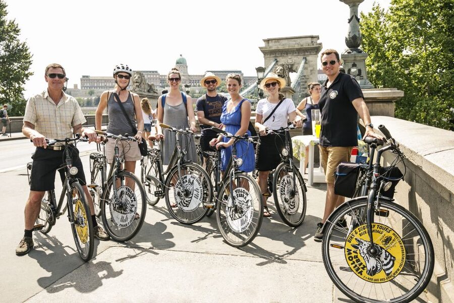 Budapest: City Bike Tour with Coffee Stop - Starting at Yellow Zebra Tours and settling into the bike-friendly rhythm