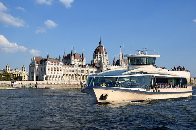 Budapest Danube Cruise with Drink, Audio Guide, Margaret Island - Comfort on a Glass Boat: Open-Air Views Without the Cold