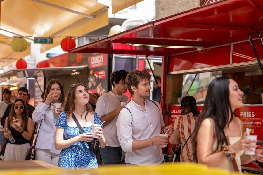 Budapest: Guided Food Tour with Wine, Beer, and Shots - Where the tour begins, Kazinczy Street Synagogue and the Jewish Quarter connection