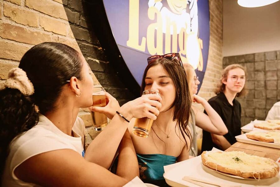 Budapest: Guided Street Food Tour with Sweet Wine - District 7 priority stops: how the four eateries actually help you