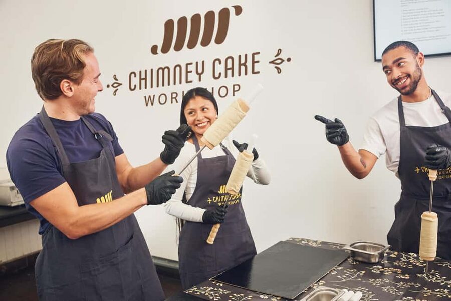 Budapest: Traditional Chimney Cake (Kürtőskalács) Workshop - Rolling the Dough and Wrapping the Spindle